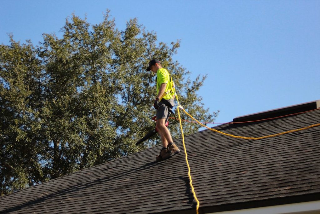 The Art of Drawing Readers In: Your attractive post title goes here a-man-on-a-roof-working-with-a-rope-g8tyblq4p04